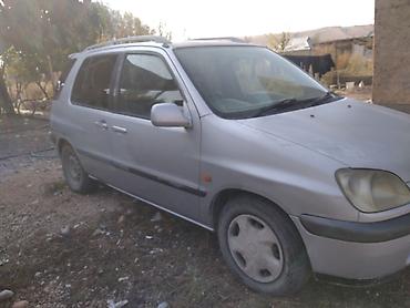 вместе дешевле: Toyota Raum: 1999 г., 1.5 л, Автомат, Бензин, Минивэн — 2