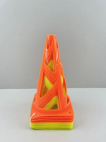 Digər idman və istirahət malları: №: 7190 Məhsulun adı: Məşq üçün konus, sarı/narıncı, plastik, 22 sm — 1