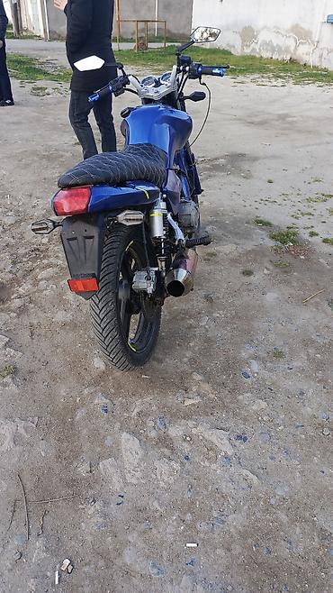 Мотоциклы: Mavi rəngli yol tipli motosiklet Texniki və dizayn xüsusiyyətləri: - — 1