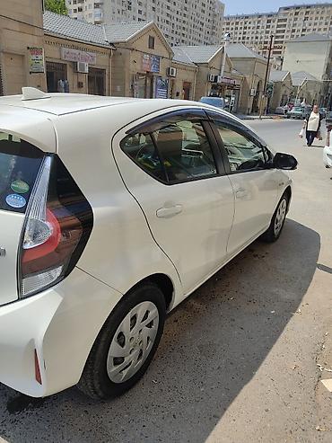 Toyota: Toyota Aqua hibrid hetçbek - Rəng: ağ - Korpus: 5 qapılı hetçbek — 3