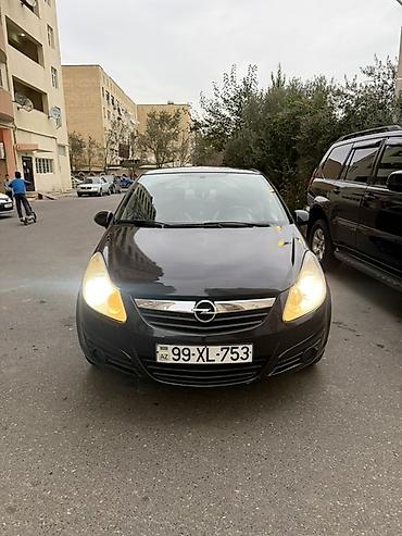 bot kar: Opel Corsa D, hetçbek kuzov, 5 qapı, qara rəng. Əsas xüsusiyyətlər: - — 1