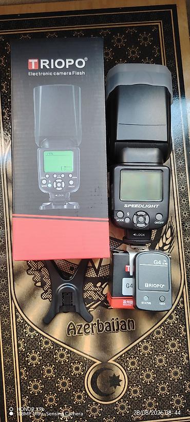 Foto və videokameralar: TRIOPO Electronic Camera Flash seti Məhsulun tərkibi: - TRIOPO — 1