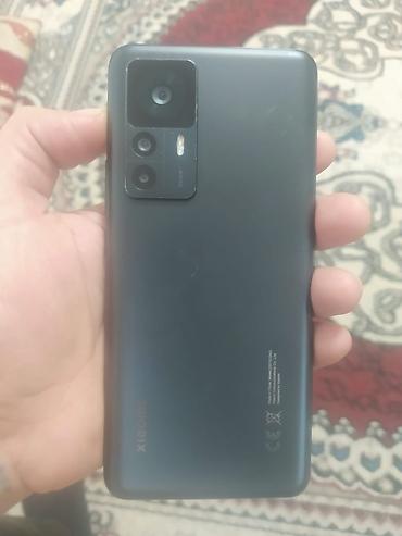 телефон fly fs520 selfie 1: Xiaomi 12T, 256 ГБ, цвет - Черный, 
 Сенсорный, Отпечаток пальца, Две SIM карты — 1