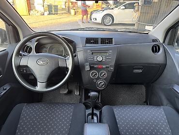 бу болон: Daihatsu Cuore: 2009 г., 1 л, Автомат, Бензин, Хэтчбэк — 7