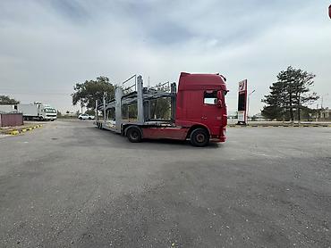 с линией: Автовоз DAF XF с двухъярусным прицепом-лоуадером для перевозки — 2