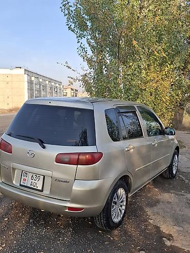 мини желмаян: Mazda Demio: 2003 г., 1.3 л, Автомат, Бензин, Хетчбек — 7