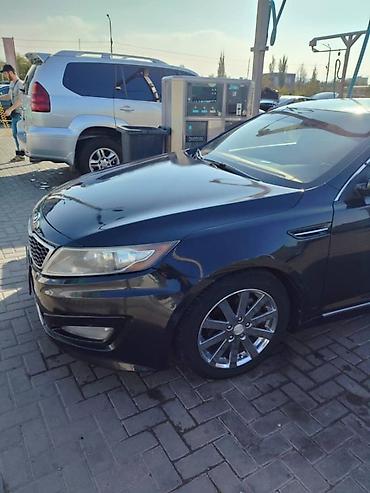 выхлоп на е34: Kia Optima: 2012 г., Автомат, Гибрид, Седан — 4