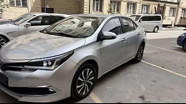 i 8: Toyota Corolla: 2019 г., 1.8 л, Вариатор, Гибрид, Седан — 2