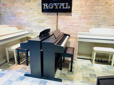 elektron pianino: Koreya istehsali olan dünya şöhrətli Kurzweil pianoları. Sevimli