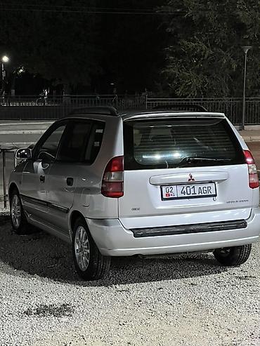 молдинги е39: Mitsubishi Space Star: 2002 г., Минивэн — 2