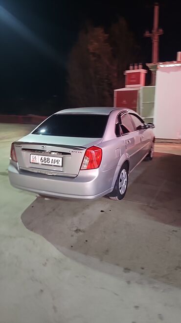 бампер на опель вектра б: Daewoo Lacetti, серебристый седан. Основные особенности: - Кузов