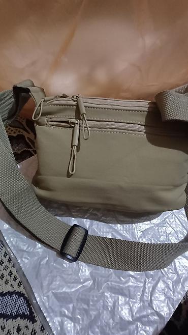 Классические сумки: Продаётся женская сумочка с длинным ремнём,материал плащёвка мягкая at lalafo.kg — 5 Классические сумки: Продаётся женская сумочка с длинным ремнём,материал плащёвка мягкая — 5