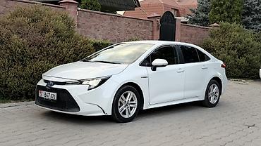 камри 75 2022: Toyota Corolla: 2020 г., 1.8 л, Вариатор, Гибрид, Седан — 3