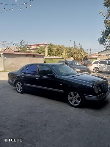 Mercedes-Benz: Mercedes-Benz E-Class: 2.3 l | 1995 il Sedan — 15