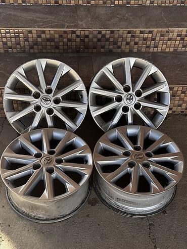 Комплект оригинальных литых дисков Toyota (4 шт.) - Диаметр: 16"