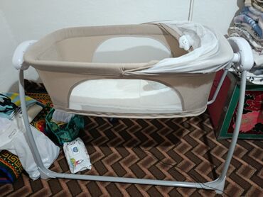 шкаф каракол: Манеж керебет, Жаңы, Бүктөө, Желим