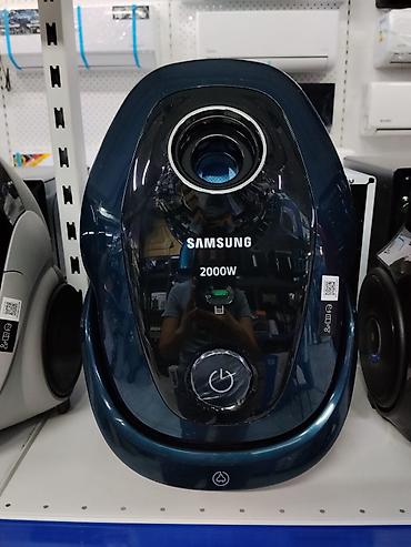 Пылесос Samsung, мощность 2000 Вт. Особенности: - Сильная тяга для