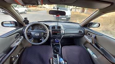мазда mvp: Mazda 323: 2001 г., 1.6 л, Механика, Бензин, Универсал — 6