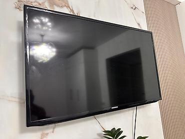 Телевизоры: Ютуб приставка имеется, пульт и кабель HDMI, производство Малайзия — 1