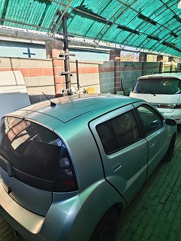 toyota opa 2003: Компактный городской хэтчбек с необычным футуристичным дизайном — 7