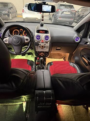 bot kar: Opel Corsa D, hetçbek kuzov, 5 qapı, qara rəng. Əsas xüsusiyyətlər: - — 10