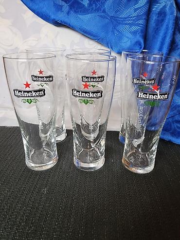 trimer lilly: Case nove,vintaz Heineken za pivo 0,350 L . Case sve na njima odsjaj — 6