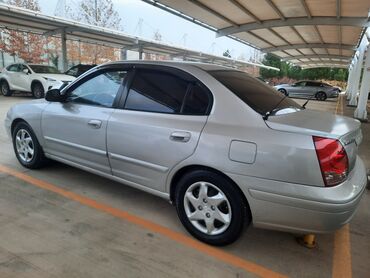 Hyundai: Hyundai Elantra: 1.6 l | 2004 il Sedan — 5