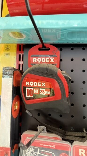флипчарты маркерная с дополнительными планками: Рулетка Rodex длиной 10 метров и шириной 25 мм. Компактный корпус