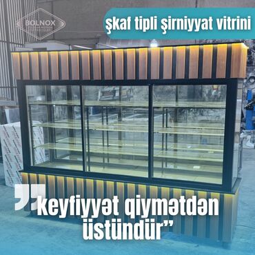 redbul soyuducu: Əlbəttə! Aşağıda şəkildəki "Şkaf tipli şirniyyat vitrini" haqqında
