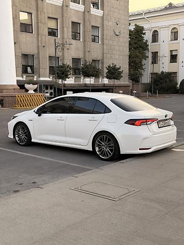 на камри 55: Toyota Corolla: 2022 г., 1.8 л, Вариатор, Гибрид, Седан — 7