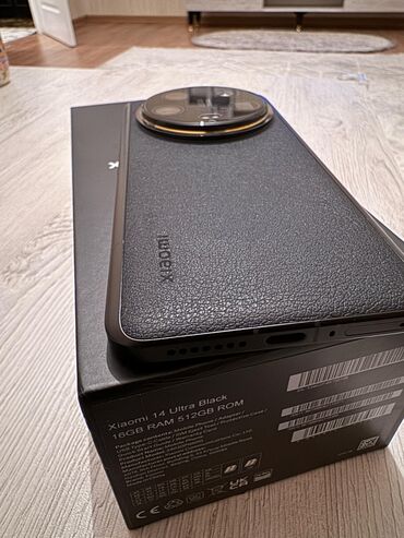 Xiaomi: Xiaomi 14 Ultra, 512 GB, rəng - Qara, 
 Barmaq izi, Simsiz şarj, İki sim kartlı