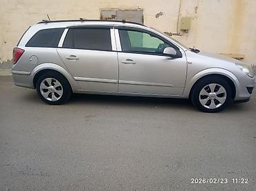 запчасти opel vectra a: Opel Astra Caravan (universaı), gümüşü rəng. Xüsusiyyətlər: - Kuzov — 4