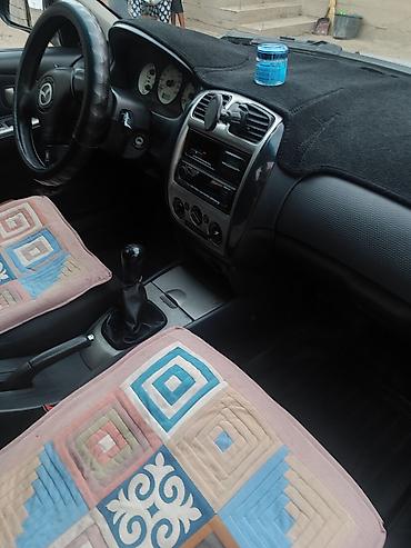 Mazda: Mazda 323: 2000 г., Универсал — 7