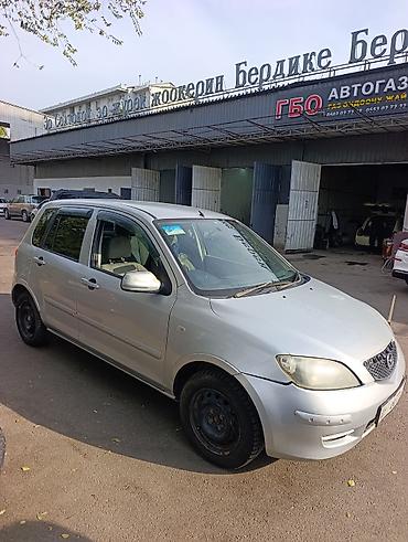 Mazda Demio: 2003 г., 1.3 л, Автомат, Бензин, Хэтчбэк