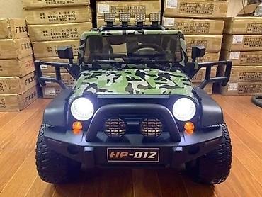 Uşaq üçün elektrik maşınları: Hərbi və ağ rəng rəngləri ilə stocklarıza yenidən gələn Jeep Hp-012 — 4