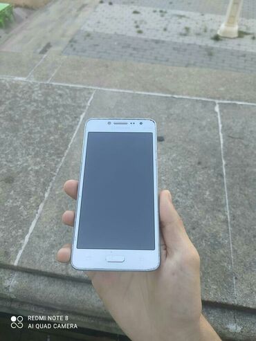 telefon qoruyucu: Samsung Galaxy J2 Prime, 4 GB, rəng - Boz, İki sim kartlı