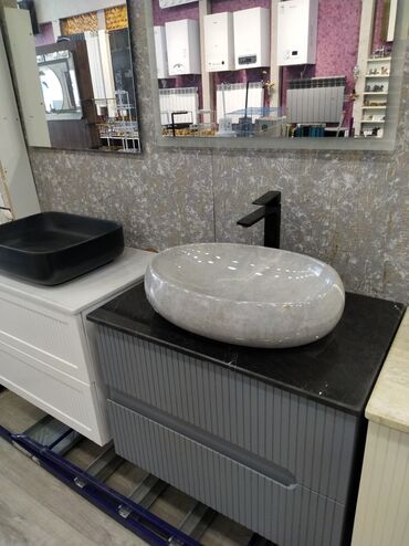Металлопрокат: Oval formalı, boz rəngli səth üstü çanaq. Bu çanaq hamam otaqları üçün
