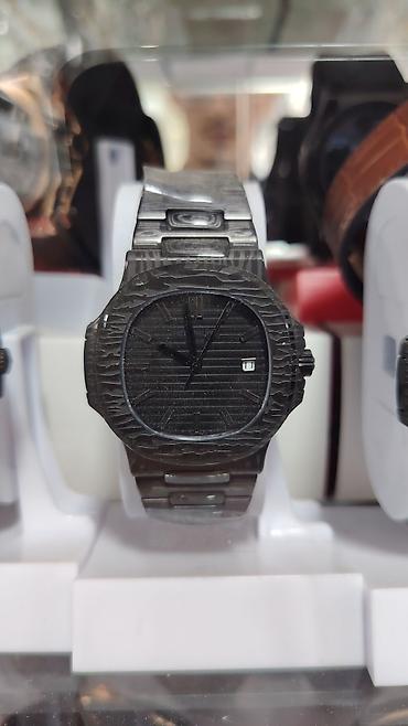 Patek Philippe tərzində qol saatları – qara dizaynlı, klassik Nautilus