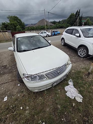 hyundai i30 oluxanası: Nissan Sunny: 1.6 l | 2007 il Sedan — 5