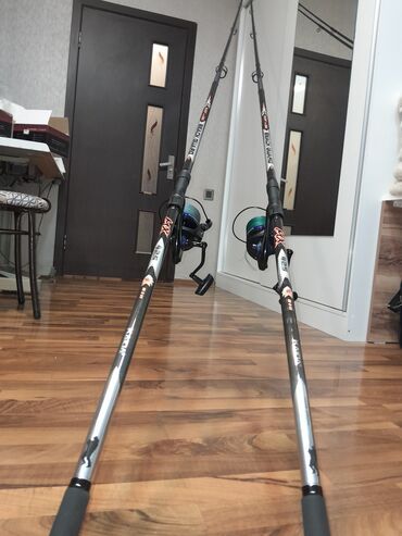 Ovçuluq və balıqçılıq: İki ədəd Dolphin PS 9000H balıq tutma çubuğu və sarğıcı. Gözəl