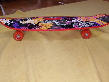 Skateboard (kruizer tipli) - Rəng: qırmızı altlıq, üst hissədə