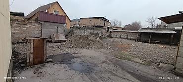 Продажа складов и мастерских: Продаётся земельный участок с хозяйственными постройками. с доходом — 7