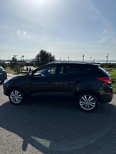 panorama maşın: Hyundai Tucson: 0.2 l | 2009 il Krossover — 3