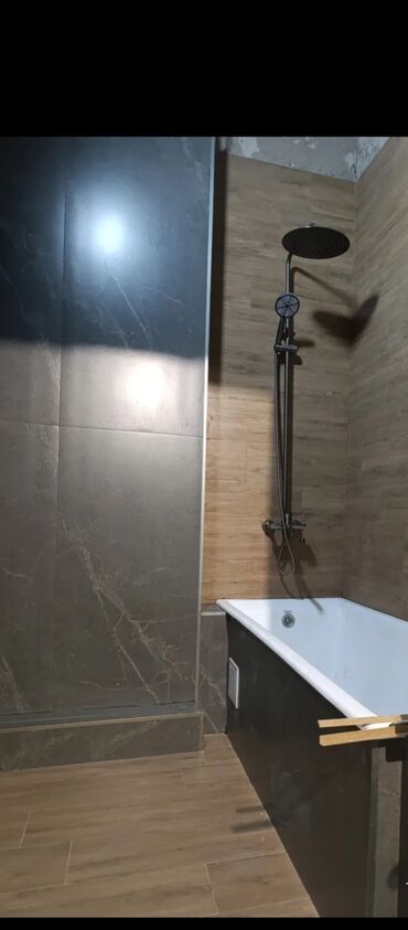 Укладка плитки: Услуги по облицовке ванных комнат и душевых плиткой/керамогранитом под — 20