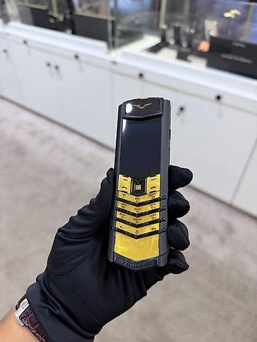qizil nomreler: Vertu 4 GB, rəng - Qızılı, Düyməli — 5