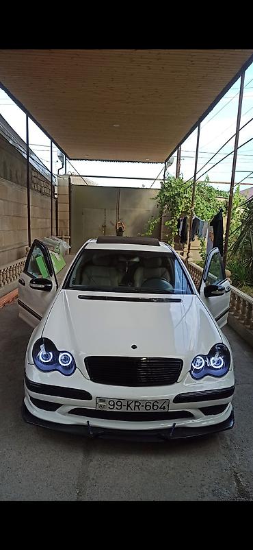 lexus 2018 qiymeti: Ağ rəngdə sedan, idman üslubunda eksteryer paketli. - Ön bamperdə — 4