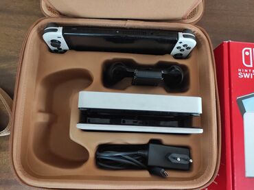 Nintendo Switch OLED: Продаётся Nintendo Switch OLED (64 ГБ) с играми и кейсом . Полный — 13