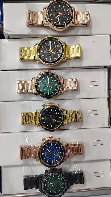 meta eynək: Müxtəlif dizaynlarda kişi qol saatları kolleksiyası Rolex, Rolex saat — 5