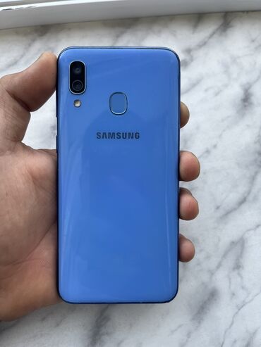 samsung galaxy grand prime: Samsung Galaxy A40, 64 ГБ, цвет - Голубой, Сенсорный, Отпечаток пальца, Две SIM карты