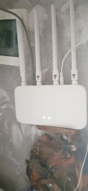 tp link archer c50 ac1200: Wi‑Fi marşrutizatoru, 4 ədəd xarici antenalı model. Aşağıdakılarla